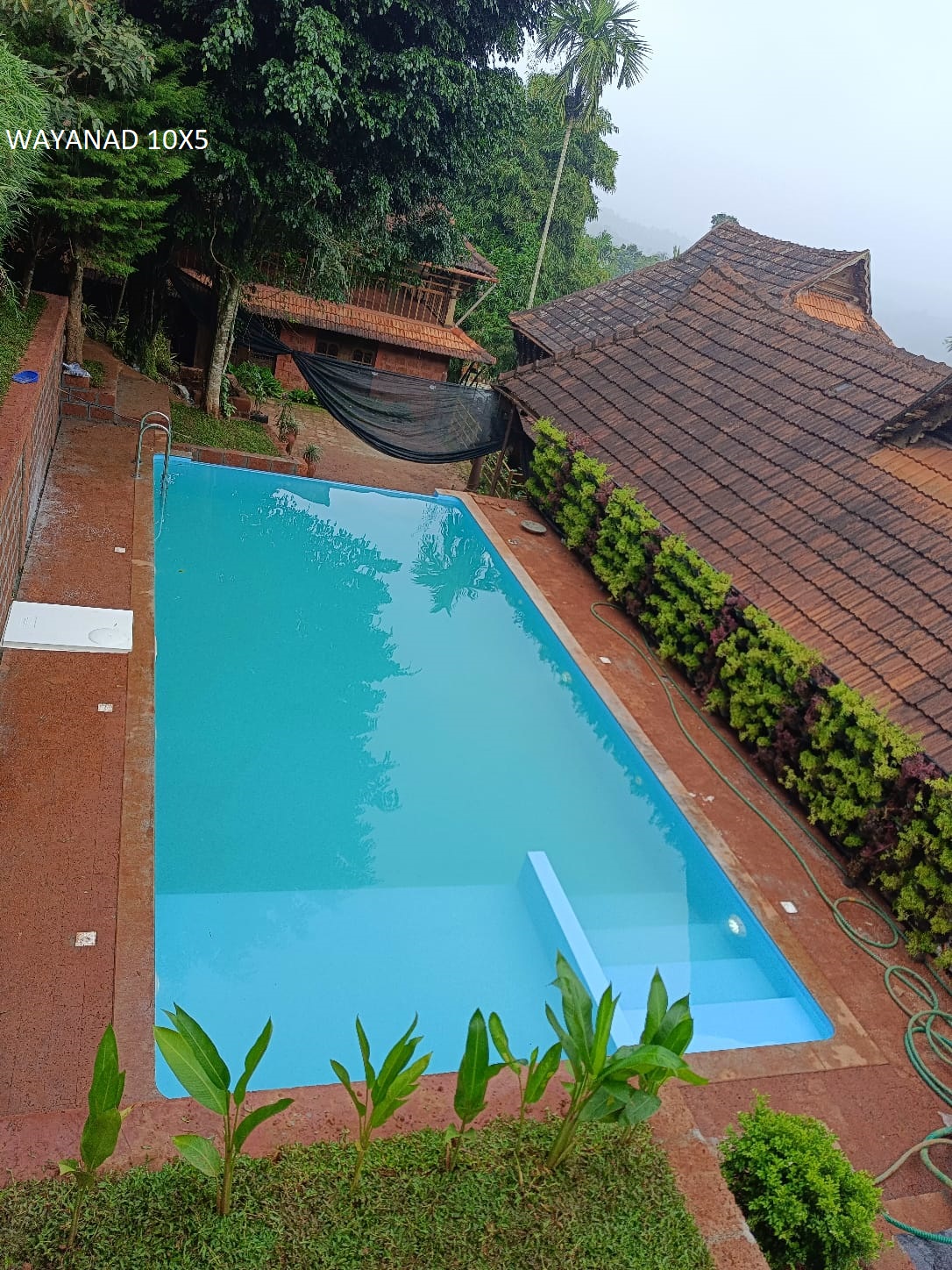 Moothedan luxury Wayanad resort pool — completed project